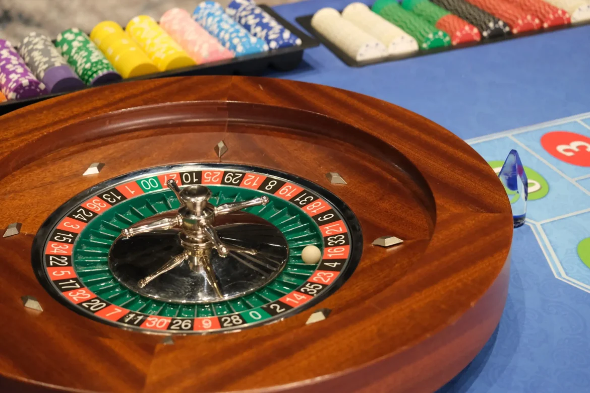Dealers stood ready at blackjack and roulette tables. Image: André Beganski/Decrypt